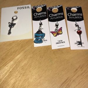 Four Charms with Clasps